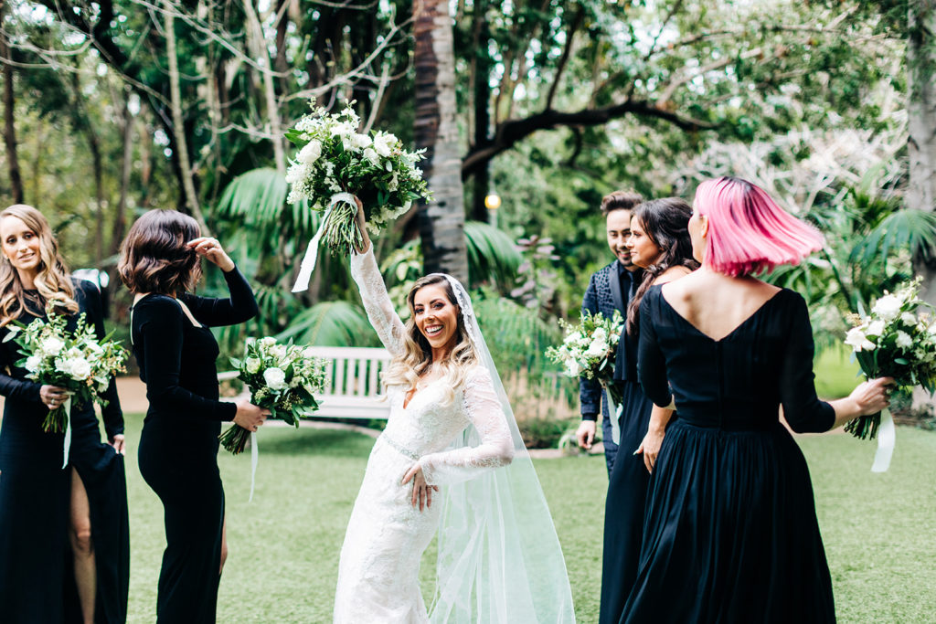 Hartley Botanica wedding photography; bride striking a pose with bridal party