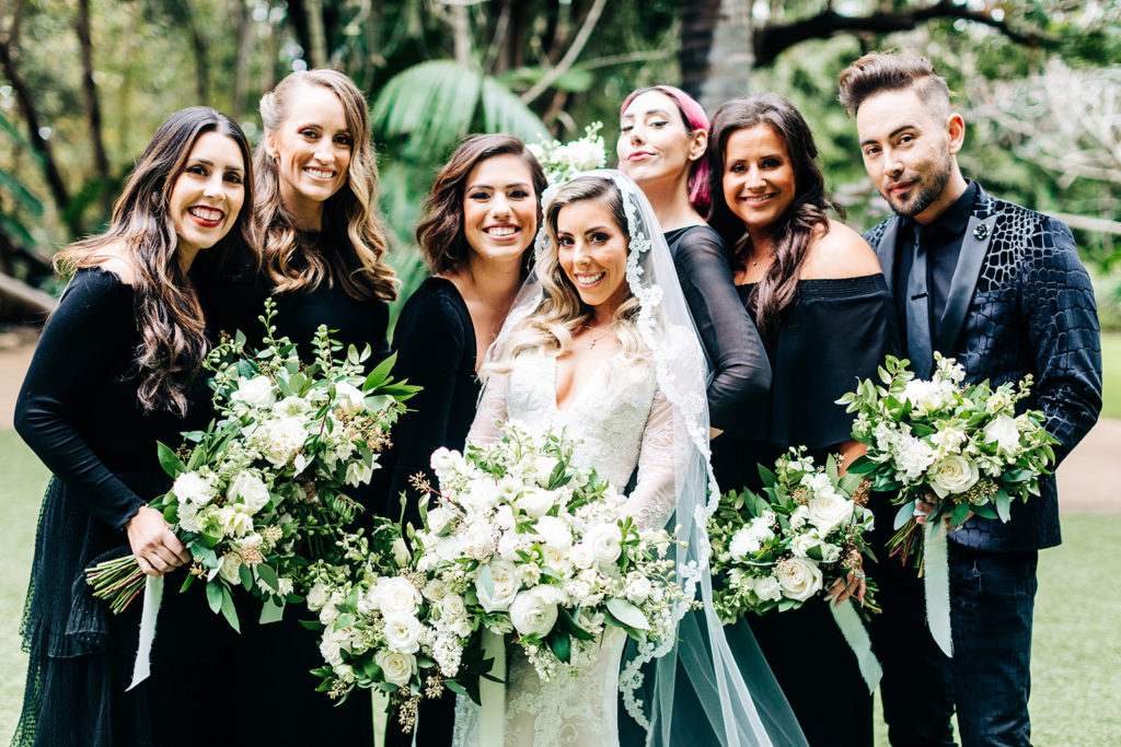 Hartley Botanica wedding photography; bridesmaids smiling with bride on wedding day