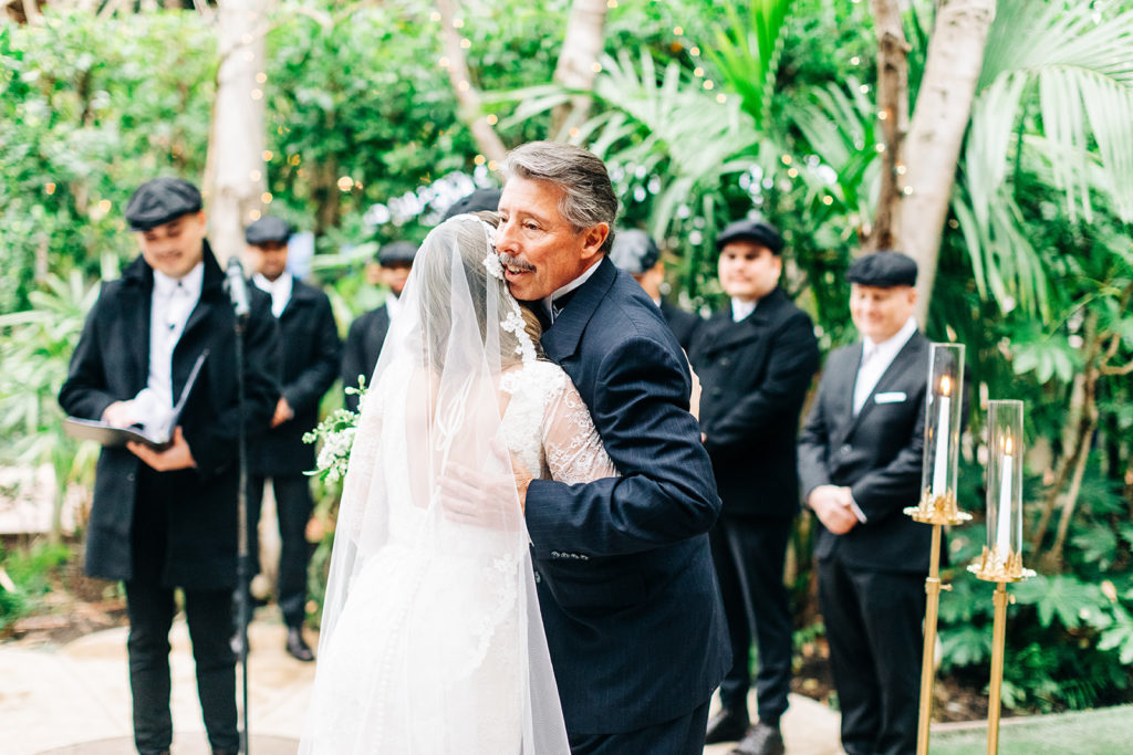 Hartley Botanica wedding photography; father hugs bride at altar