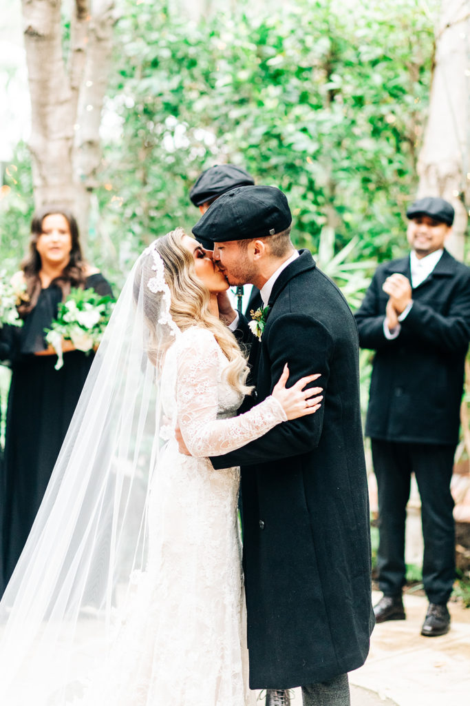 Hartley Botanica wedding photography; bride and groom kiss at the ceremony