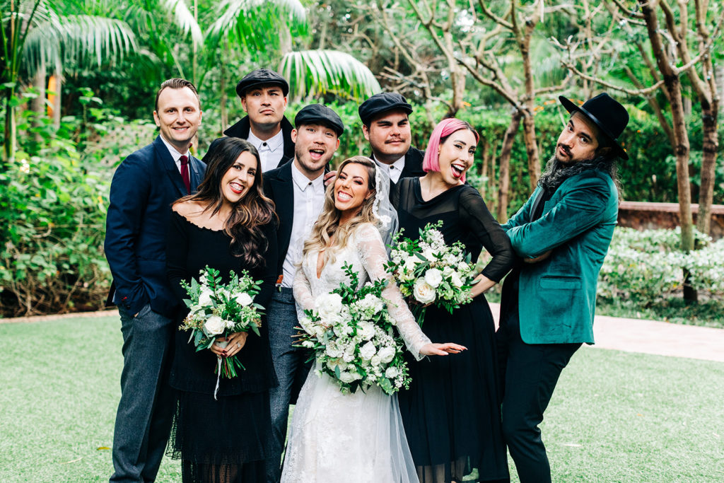 Hartley Botanica wedding photography; bride and groom smiling with wedding party