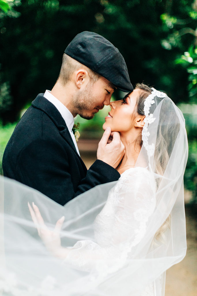Hartley Botanica wedding photography; bride and groom almost kissing