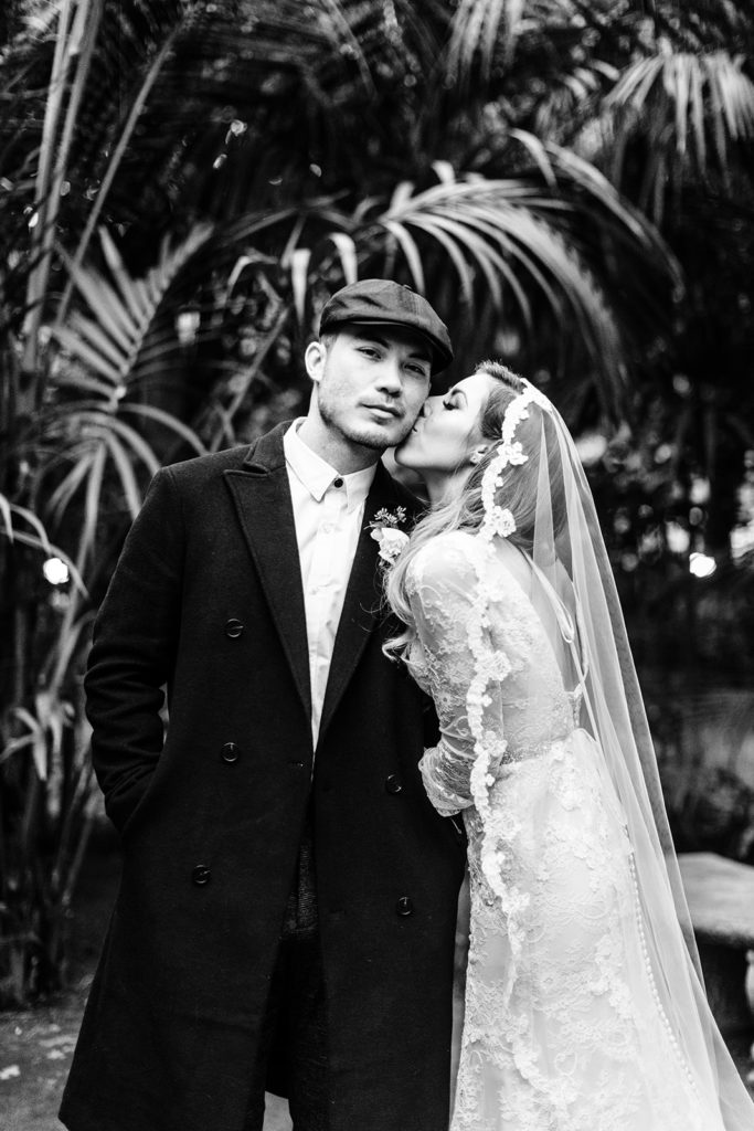 Hartley Botanica wedding photography; bride kissing groom on the cheek