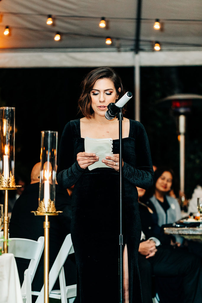 Hartley Botanica wedding photography; bridesmaid in black speaking at reception