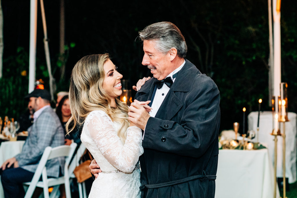 Hartley Botanica wedding photography; father smiling while dancing with bride at wedding reception