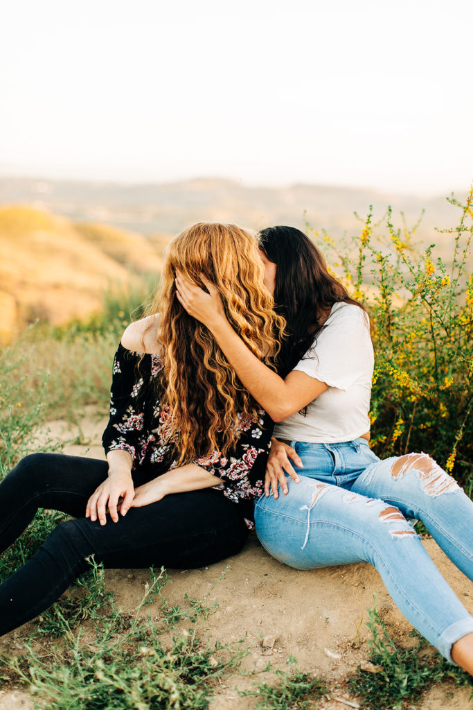 LGBTQ+ wedding photographer; two women kissing