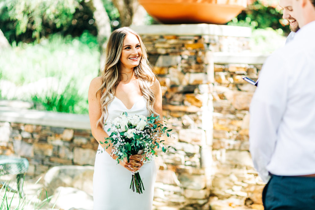 bride smiling on her wedding day at her outdoor wedding; orange county elopement photographer