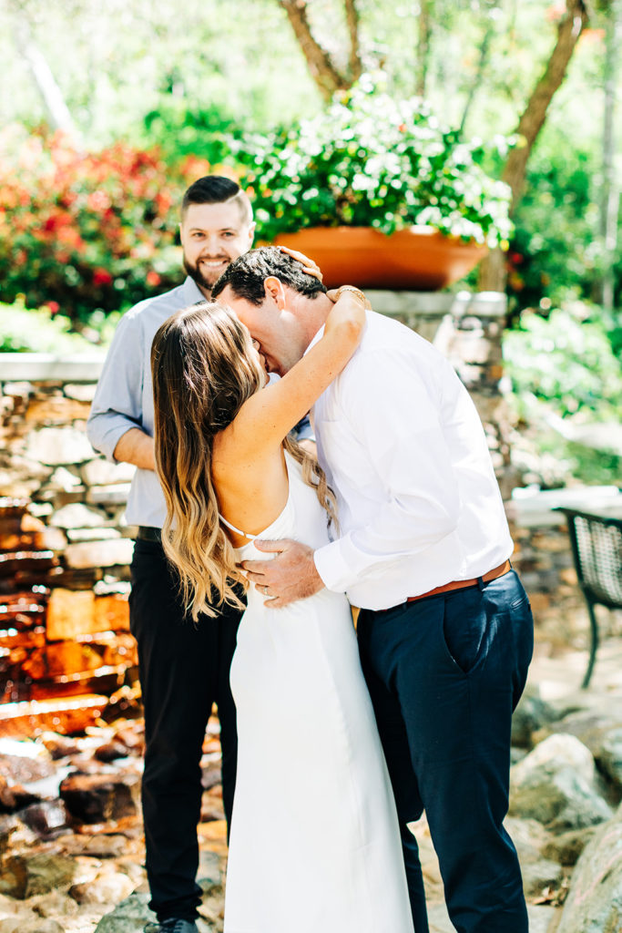 bride and groom's first kiss on their wedding day; orange county elopement photographer