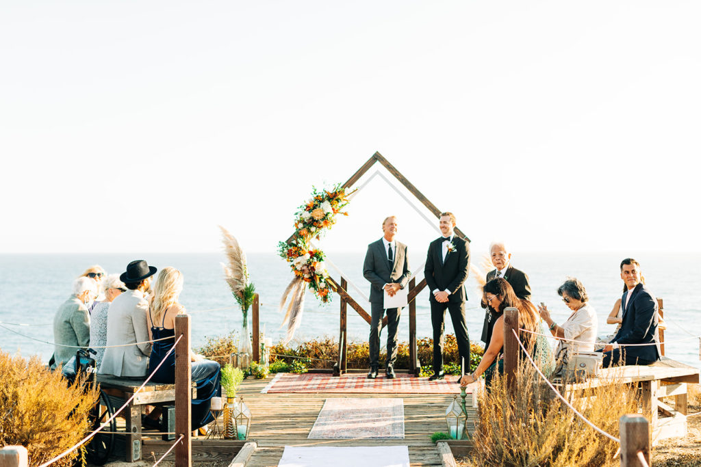 Crystal Cove Micro Wedding in Orange County; groom waiting for his bride at their micro wedding in orange county at crystal cove