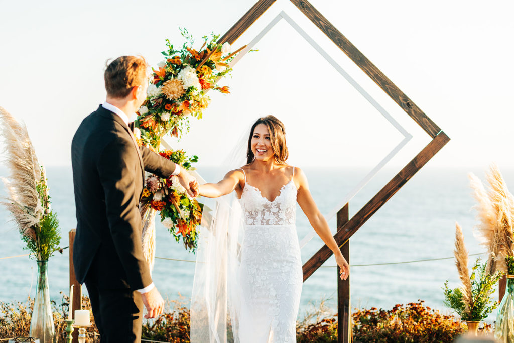 Crystal Cove Micro Wedding in Orange County; bride and groom dancing at their wedding