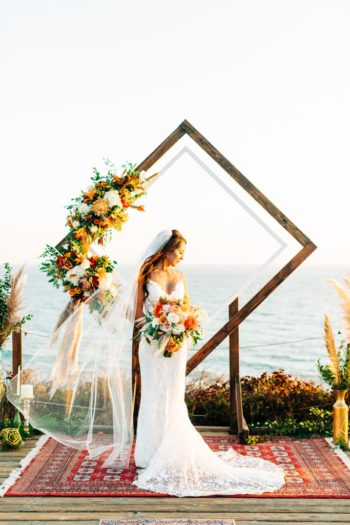 Crystal Cove Micro Wedding in Orange County; portrait of a bride on her wedding day