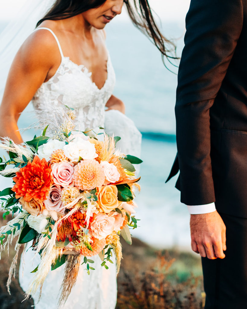 Crystal Cove Micro Wedding in Orange County; bride's flowers on her wedding day