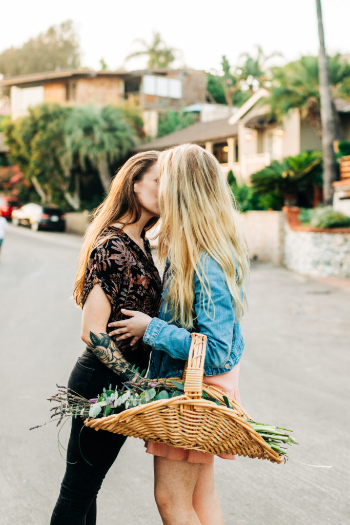 LGBTQ+ wedding photographer in san diego; two women kissing in the middle of a street