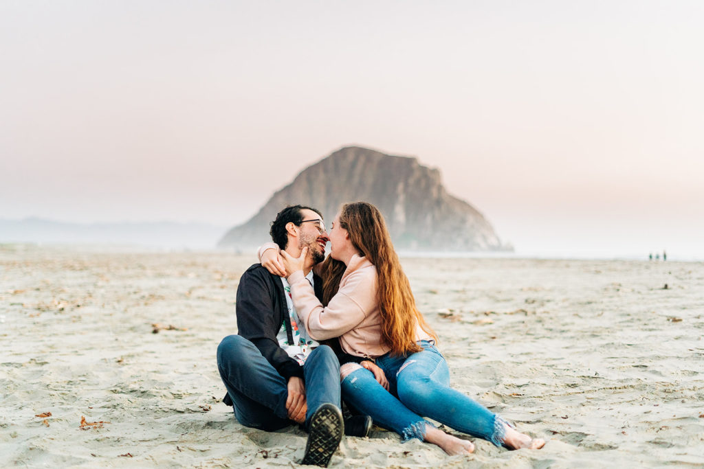 Sunset Engagement Photos at Morro Bay, morro bay wedding photographer; a man and woman in love about to kiss on the beach in morro bay, california