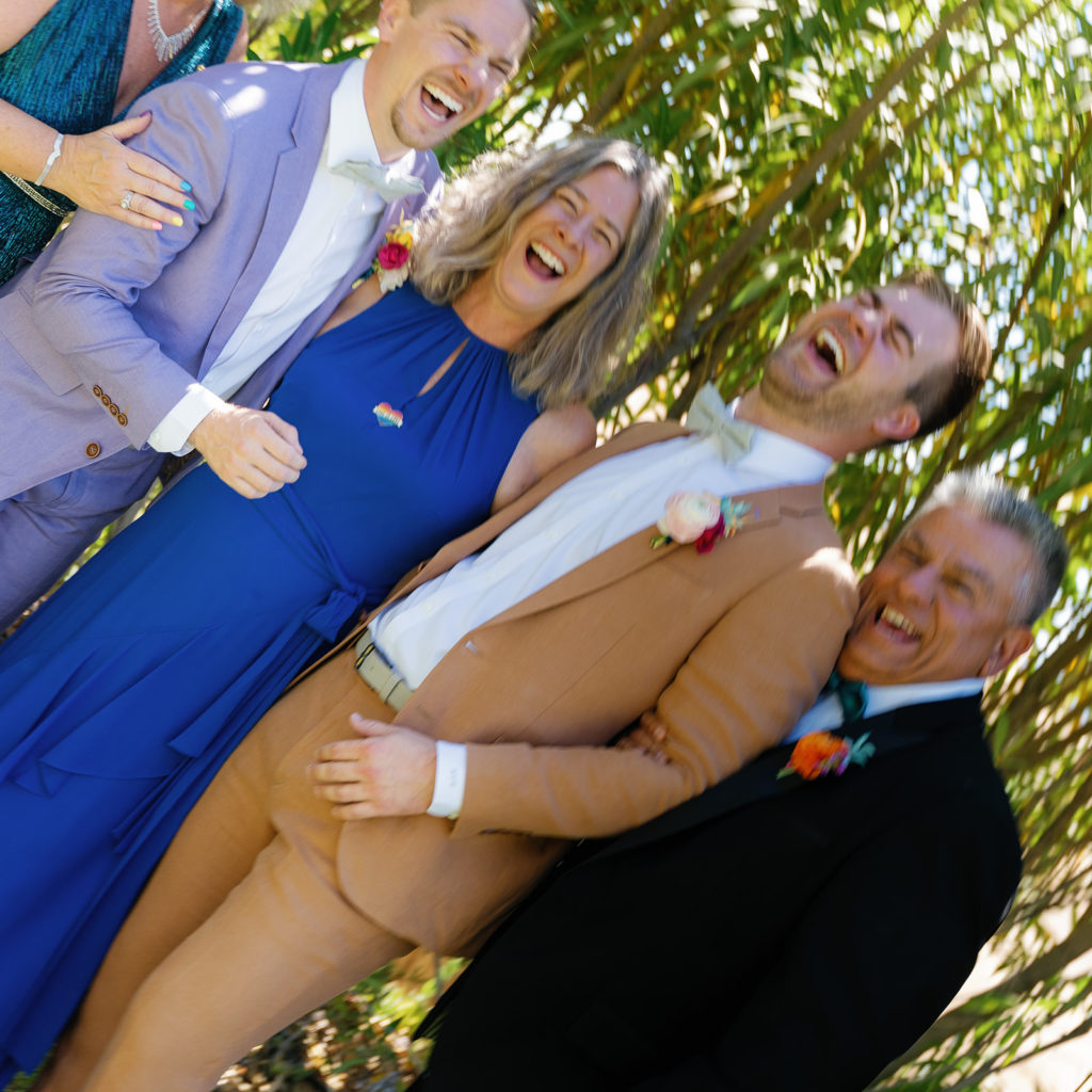 blurry family group photo at a wedding; gay wedding in temecula at mount palomar winery
