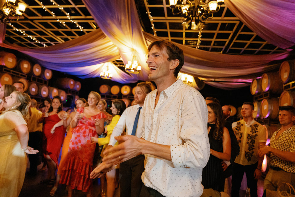 Ashton Kutcher and Mila Kunis dancing at a wedding reception; gay wedding in temecula at mount palomar winery