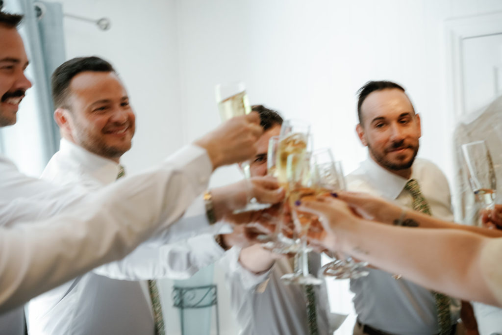 group champagne cheers; gay wedding in temecula at mount palomar winery