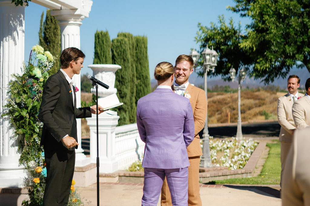 PK & Mike during their wedding ceremony; gay wedding in temecula at mount palomar winery
