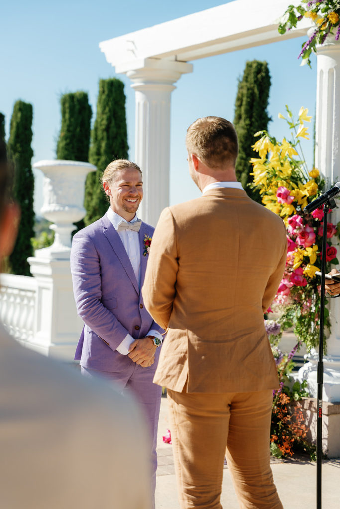Two grooms exchanging wedding vows; gay wedding in temecula at mount palomar winery