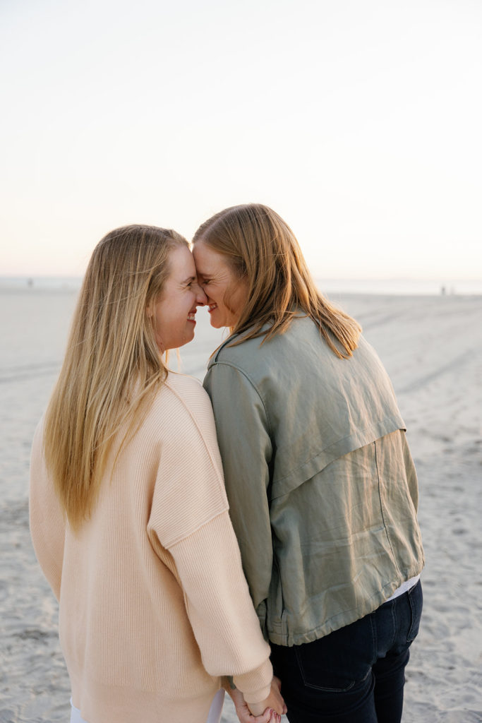 lgbtq photographer in san diego; two women in love during their proposal session, their faces are close together