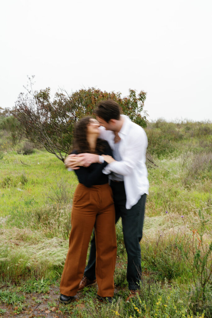 romantic san diego engagement photos; romantic location for engagement photos in san diego; a blurry photo of a couple during their photo session
